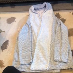 Warm knit cardigan with fur hood